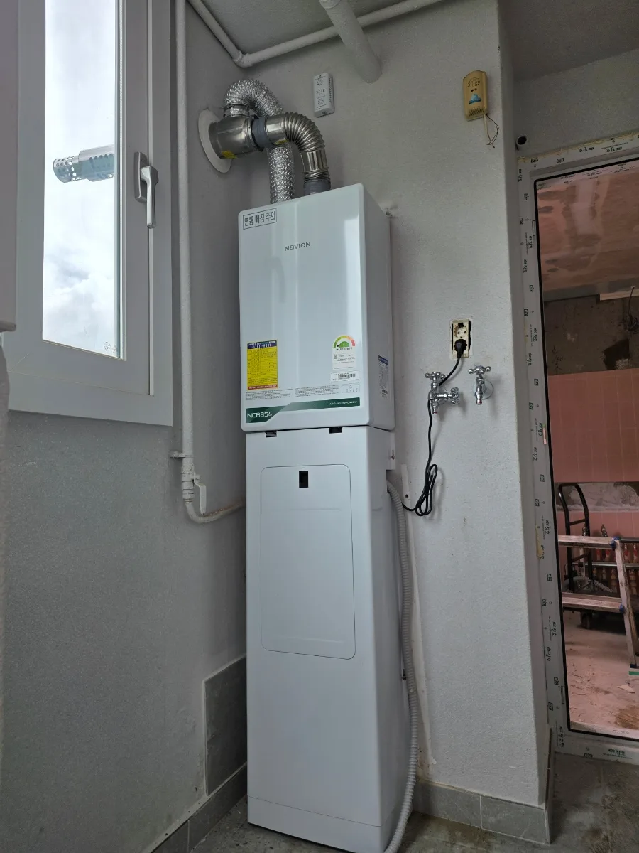 Boiler Replacement Guide 2026: Navien Installation & Pipe Finishing